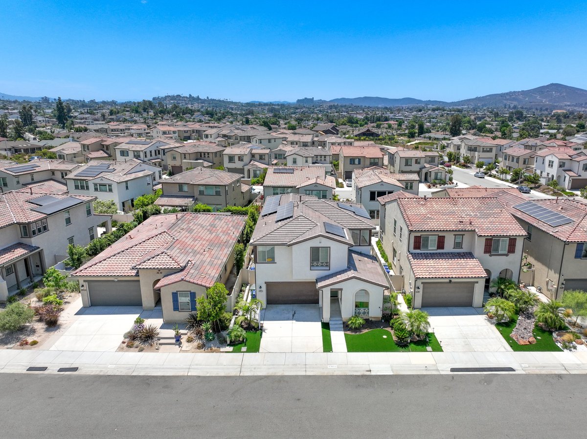 Aerial view of a master-planned residential community with larger homes