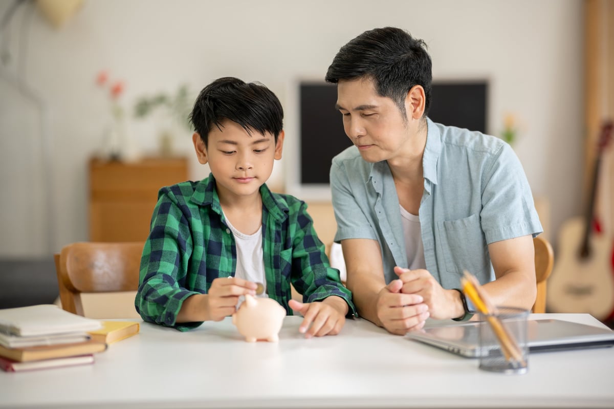 Parent and student reviewing housing finances — rent vs. buy comparison for SMU-area housing in Dallas