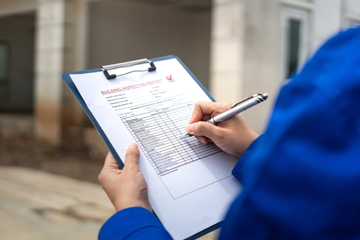 Property manager reviewing campus-area rental