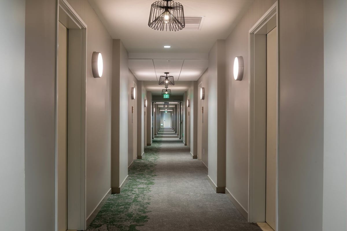 Residential corridor with newer development and established homes
