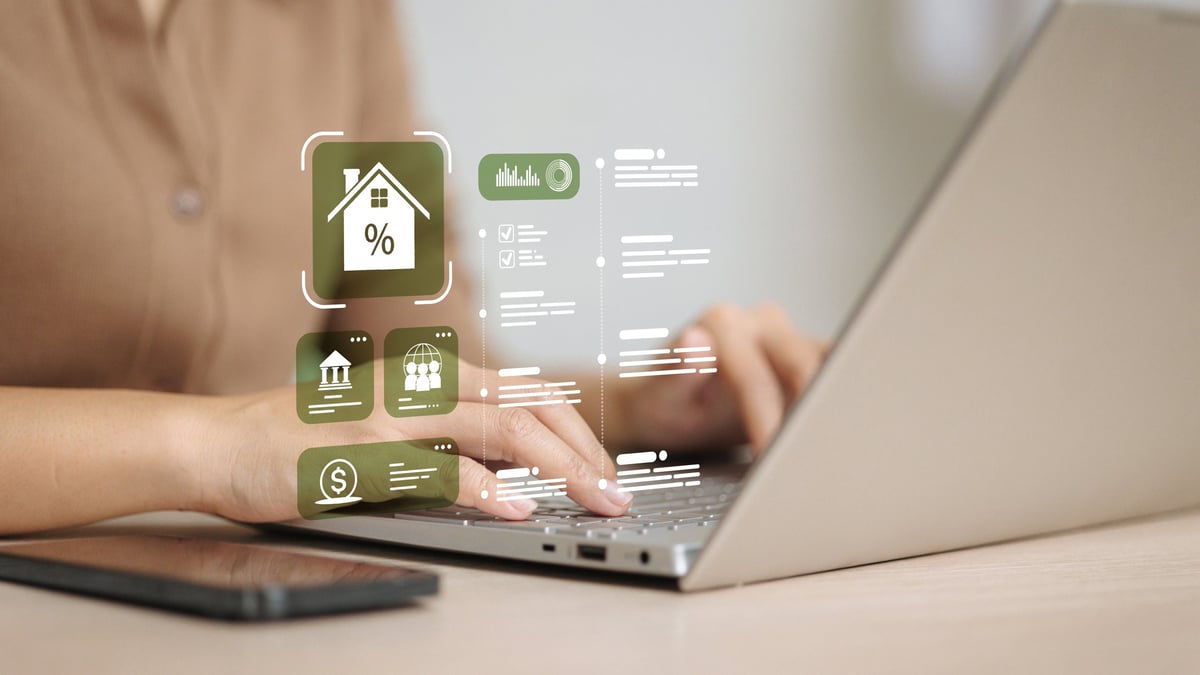 Homeowner reviewing property report and loan options on laptop — sell, refinance, or hold review near Florida State University
