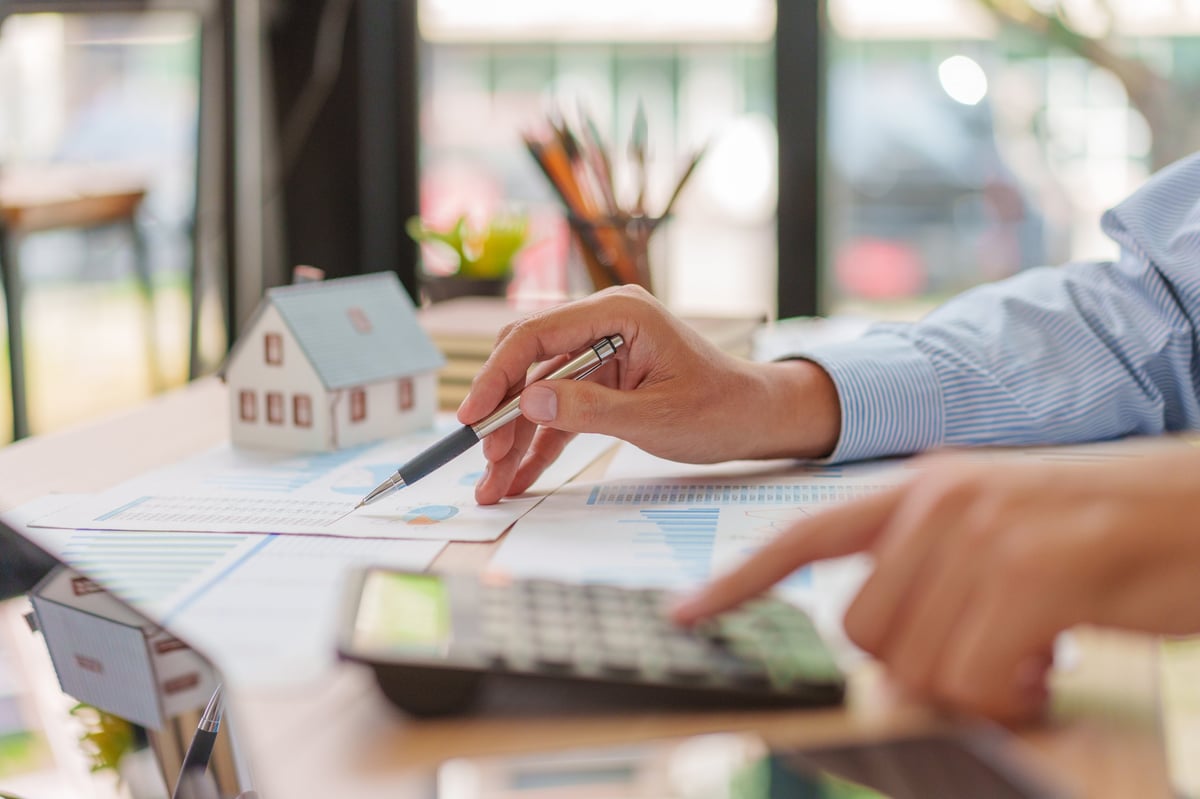Financial and mortgage documents for investment property financing near Southern Methodist University