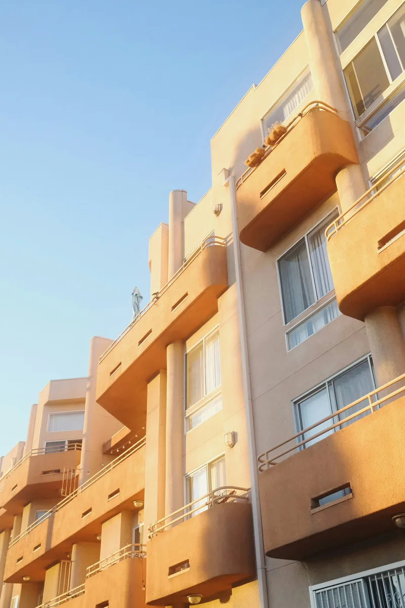 Balconies on a contemporary apartment building. Illustrative photography, not a local listing.