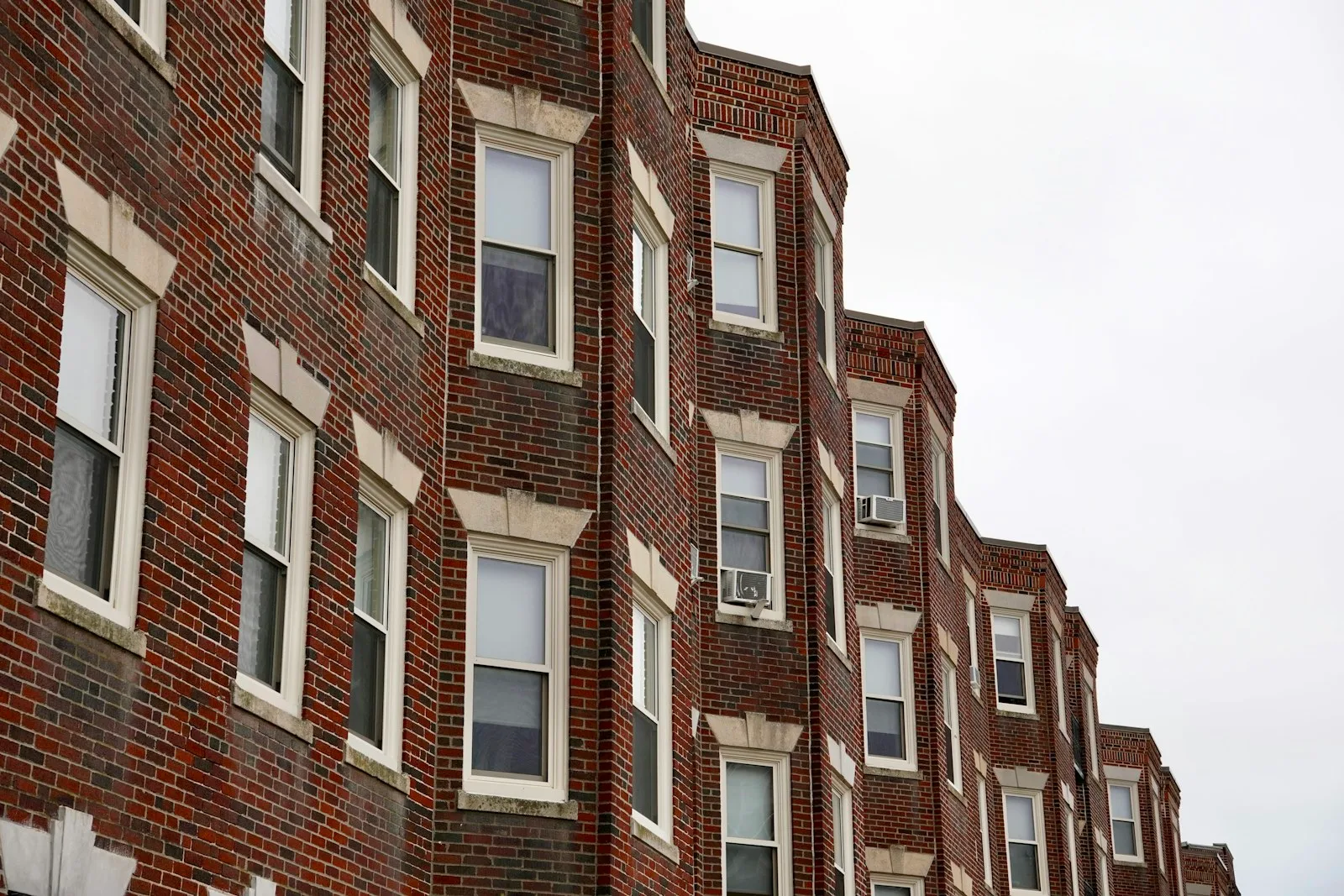 Brick apartment buildings in Boston. Illustrative photography, not a local listing.
