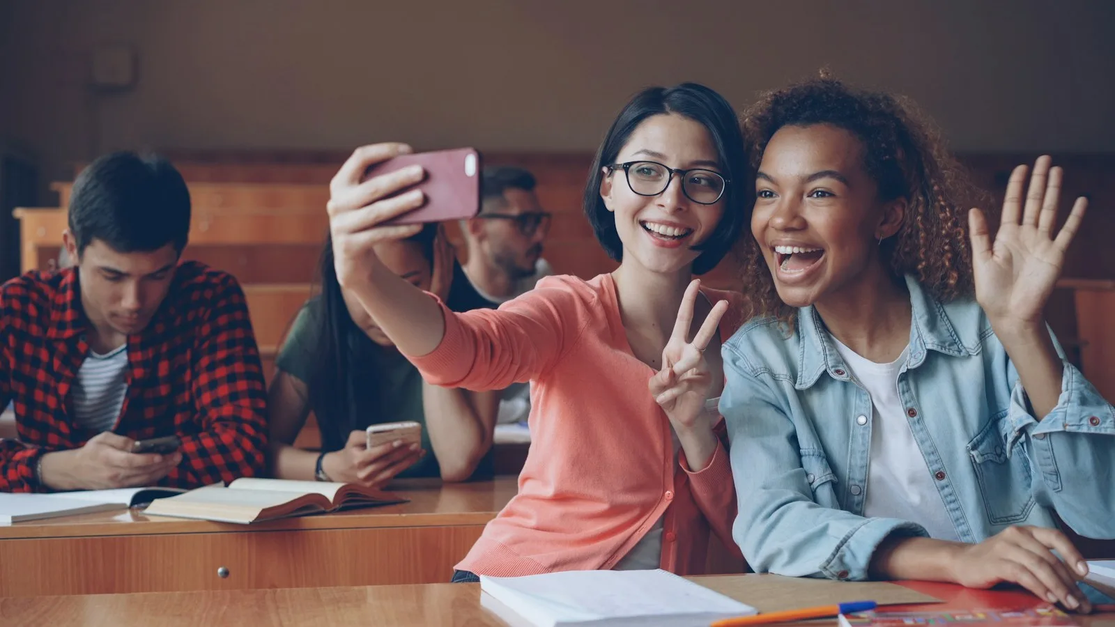 College students spending time together in a classroom. Illustrative photography, not a local listing.