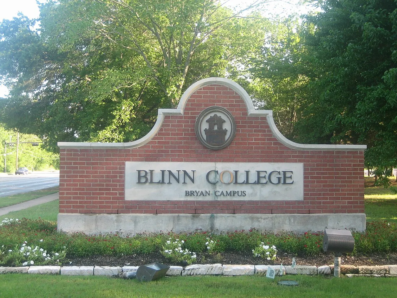 The Blinn College Bryan Campus entrance monument and landscaped grounds in Bryan, Texas.