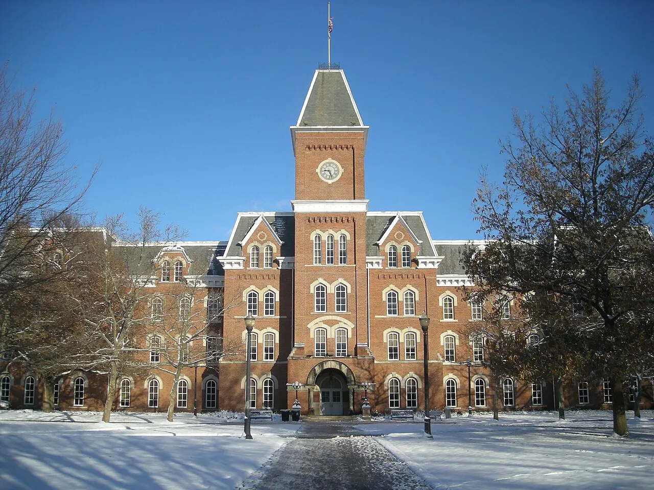 University Hall and its clock tower on The Ohio State University campus after snowfall.